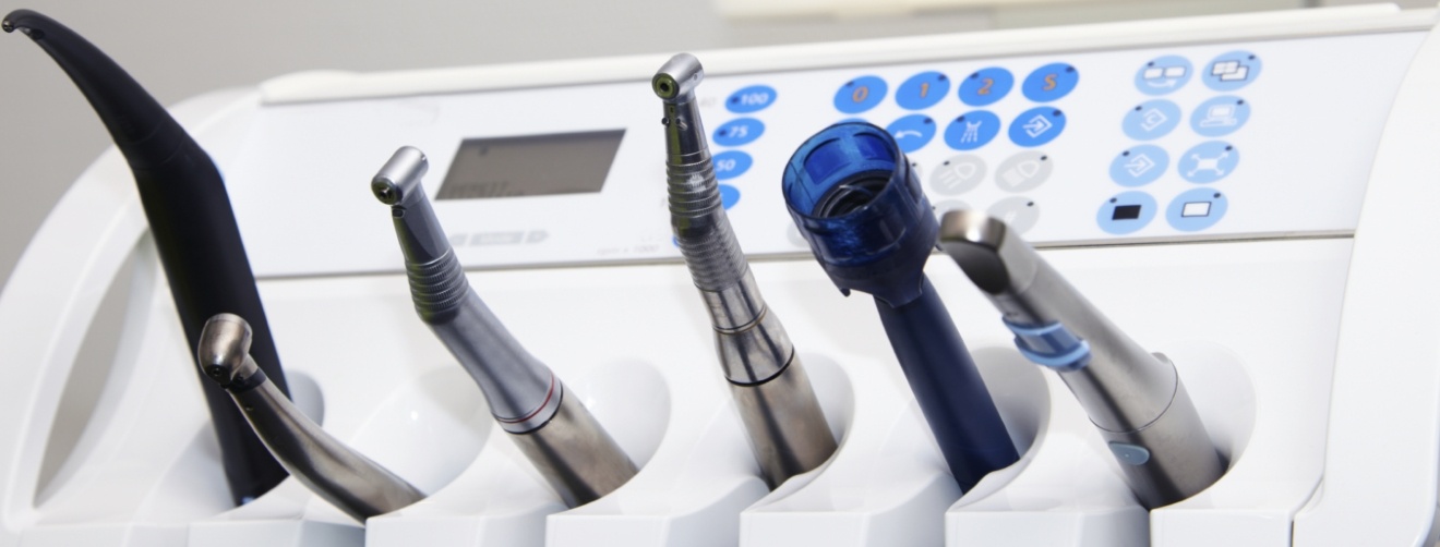 Row of dental instruments in dental treatment room