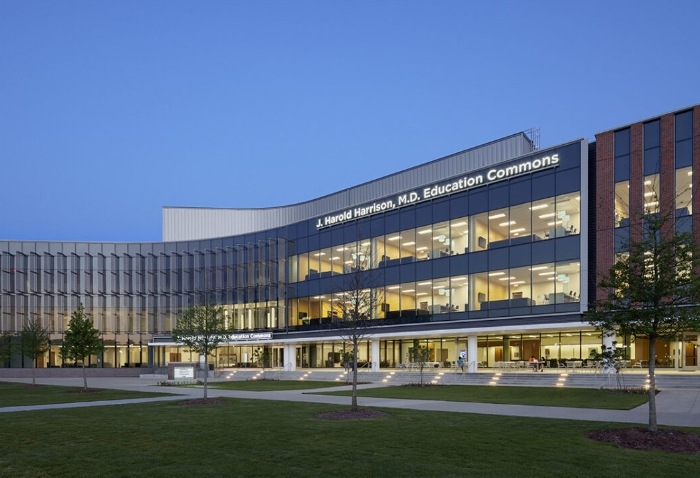 Exterior of multistoried building that reads J Harold Harrison M D Education Commons